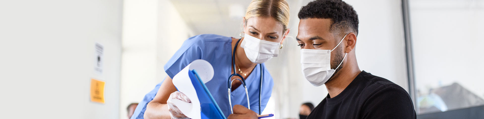 Image of nurse talking to patient