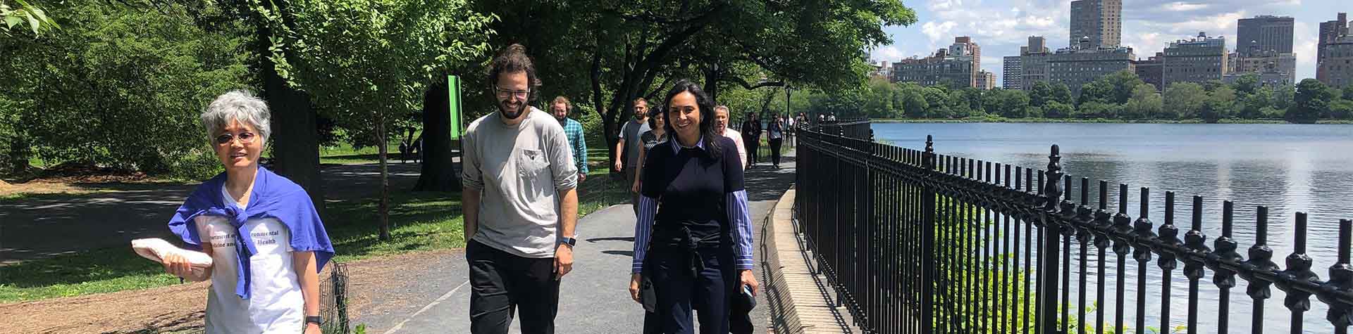 Image of people walking in park