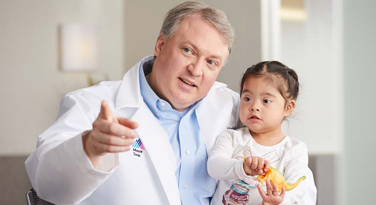 Doctor and little girl