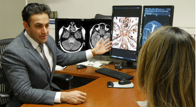 Dr Singh talking to patient