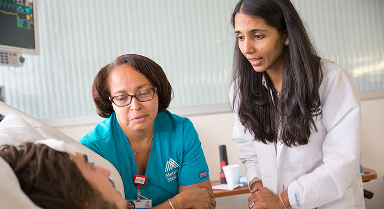 Image of nurses with patient