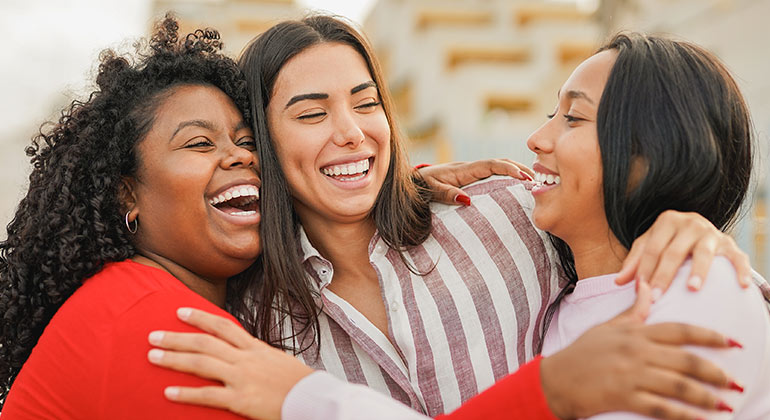 women hugging eachother