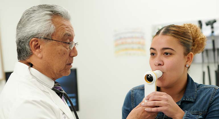 Image of doctor with female patient