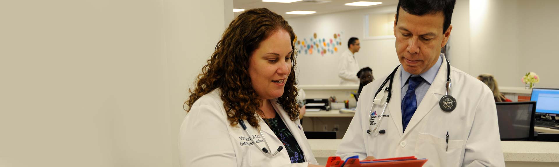 Doctors looking at files