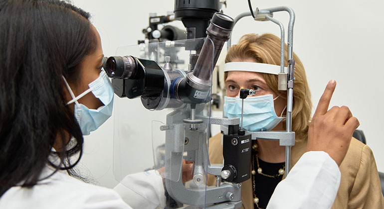 doctor examining patient eyes