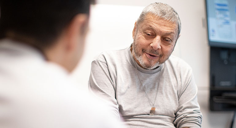 doctor talks with patient