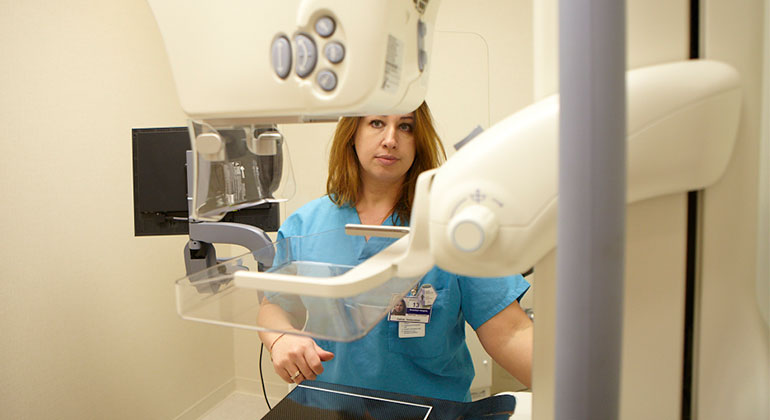 medical professional uses equipment