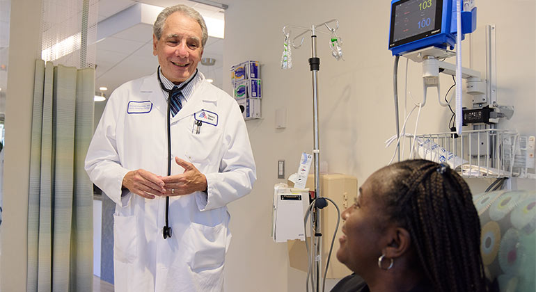 doctor talking to patient