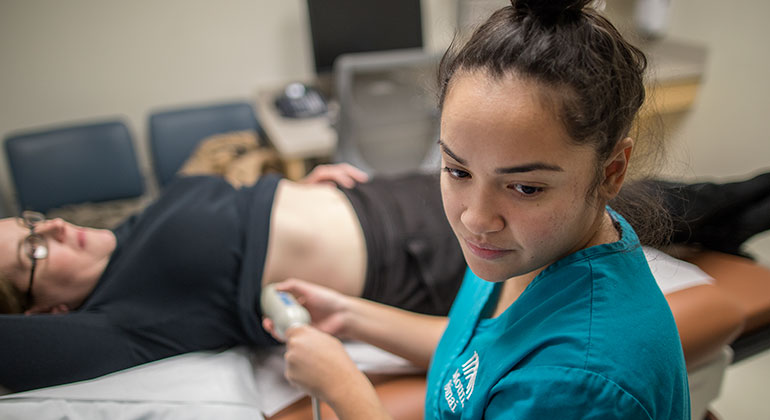 Image of nurse with patient