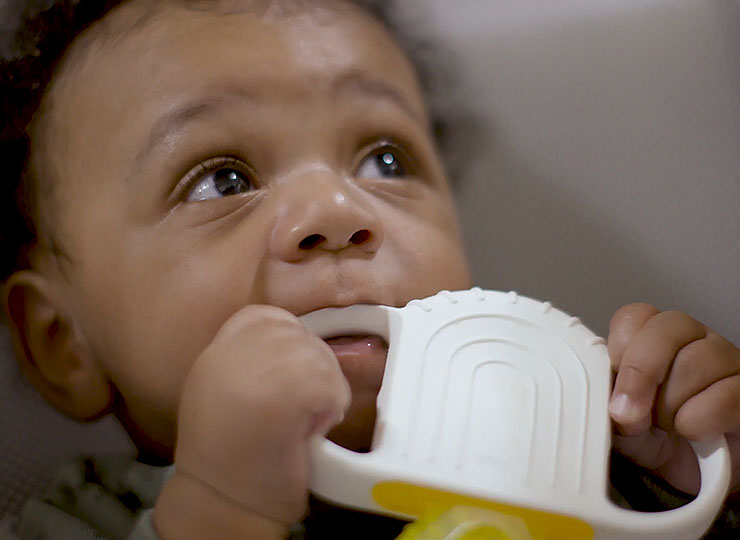 Photo of Infant patient with a teether toy