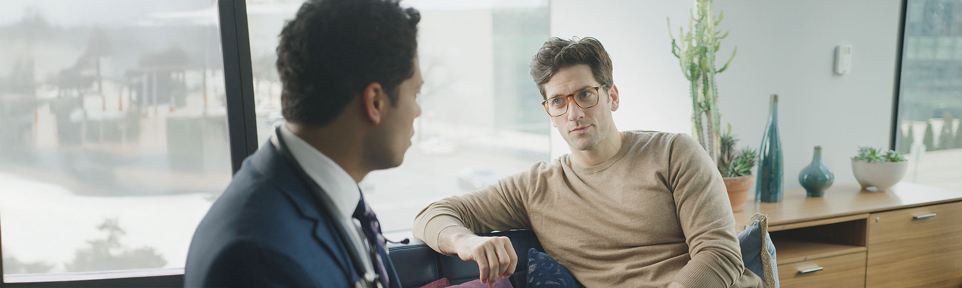 people in conversation sitting