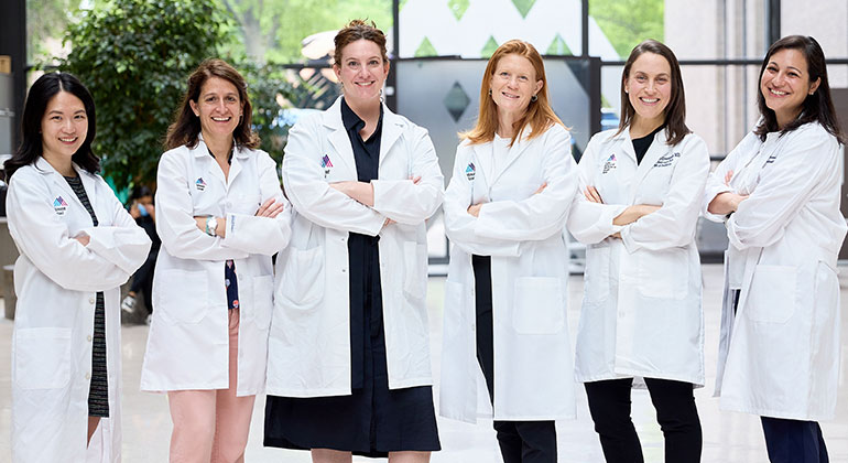 a group of doctors in hospital lobby