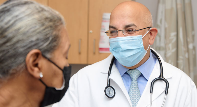 doctor talking with patient