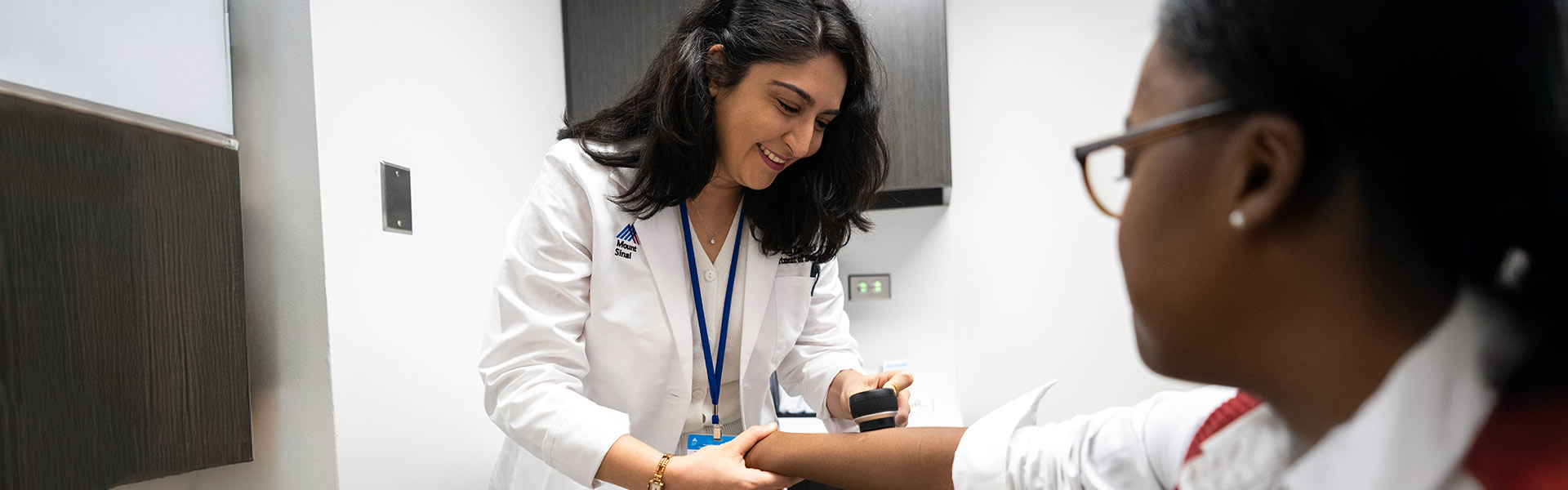 doctor caring for patient