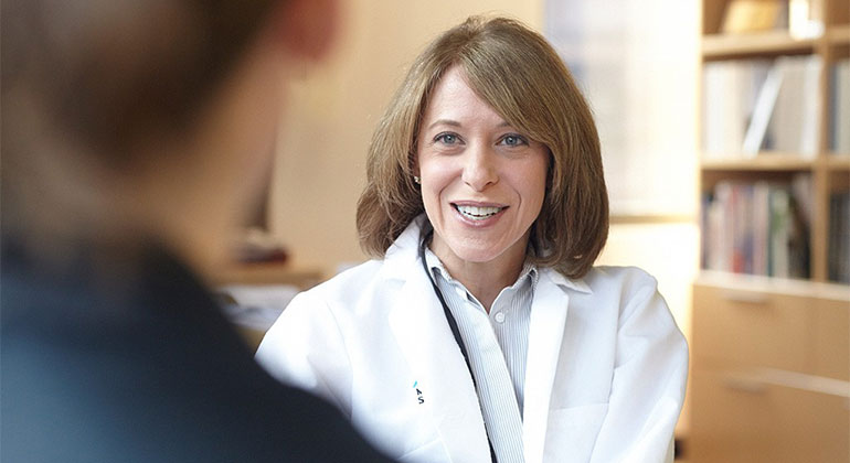 Doctor talking to patient