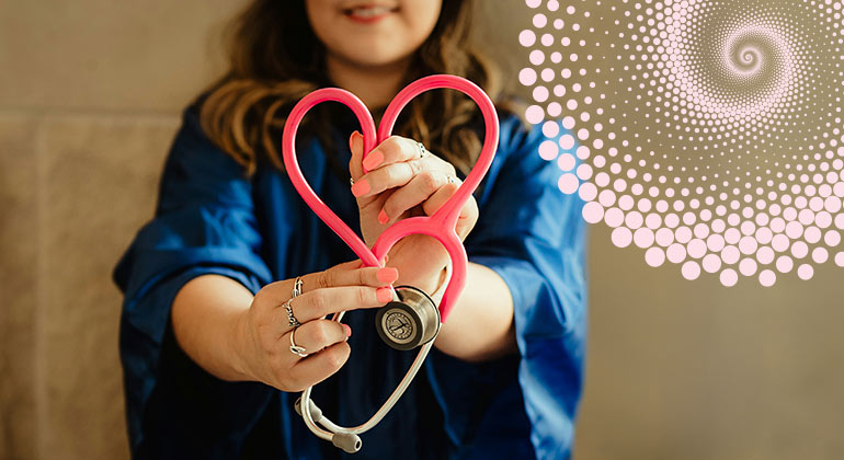 Woman holding a heart stethoscope 