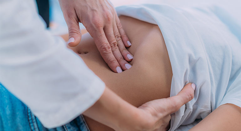 close-up of stomach area being examined