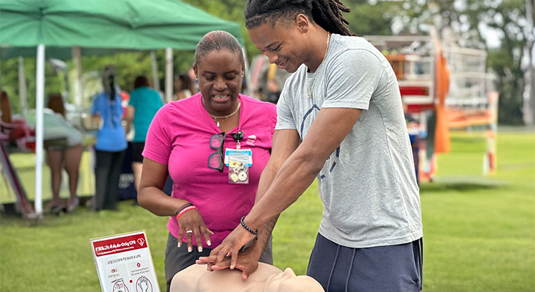 cpr demonstration at community event