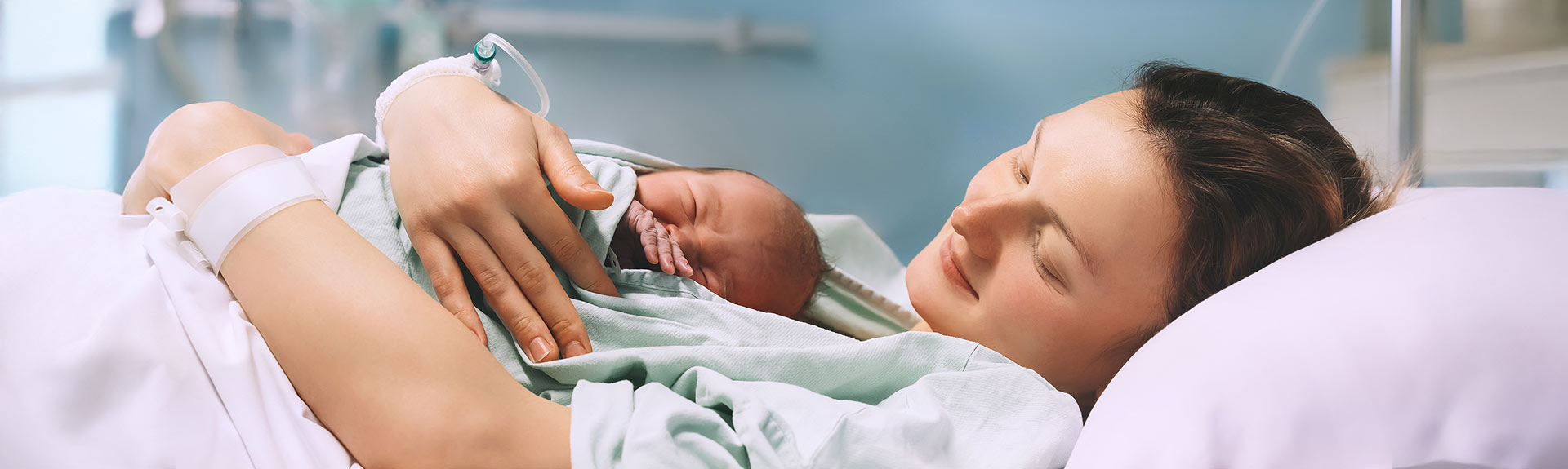 patient holding her newborn