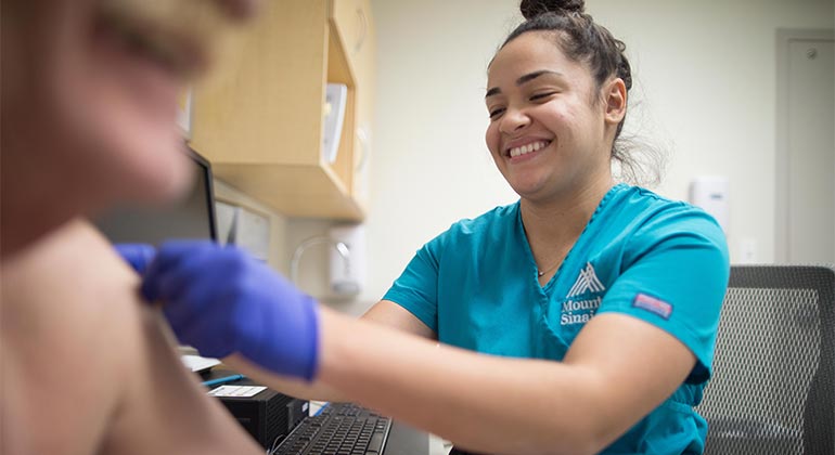 Image of nurse with patient