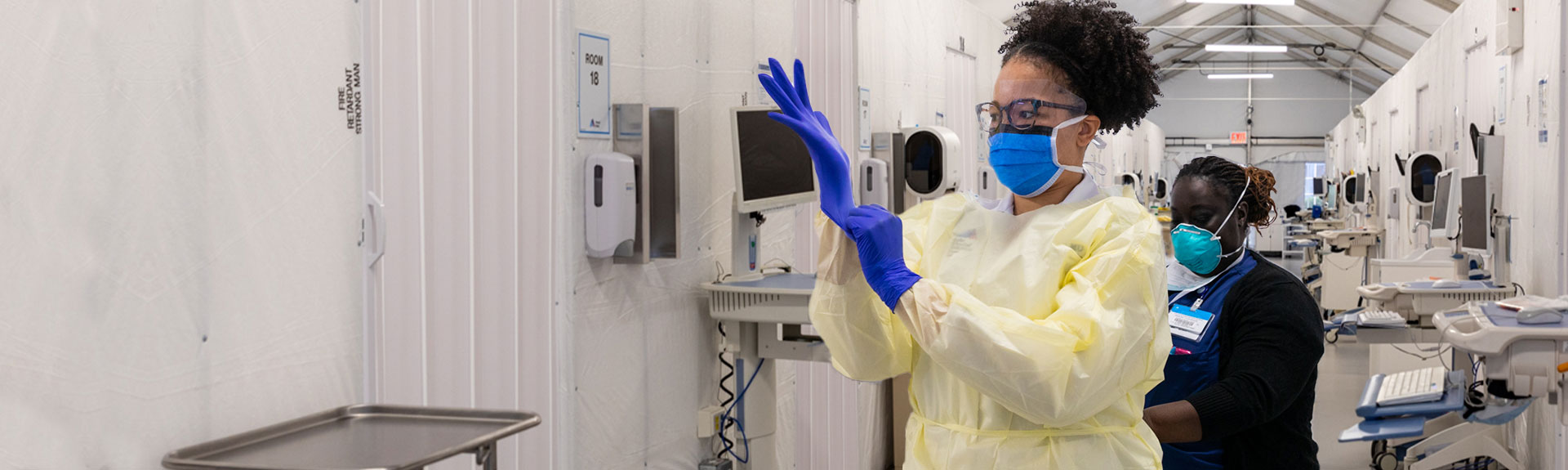 Image of nurse wearing gloves