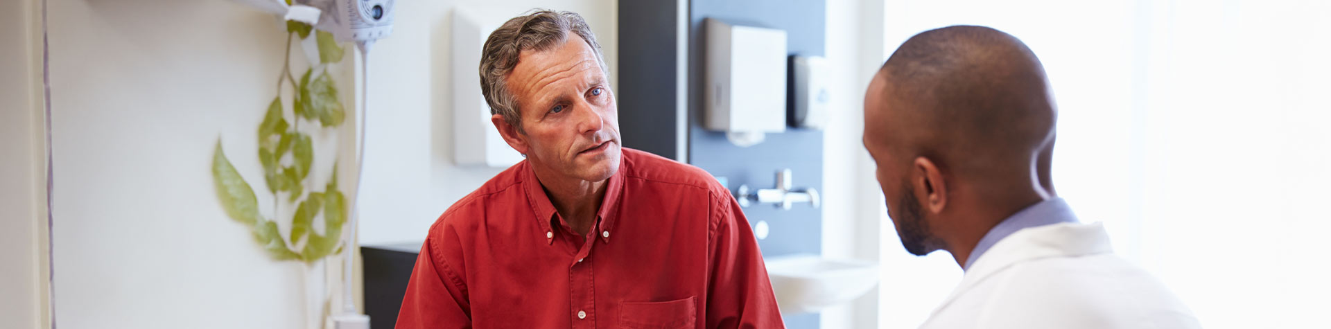 Image of doctor talking to patient