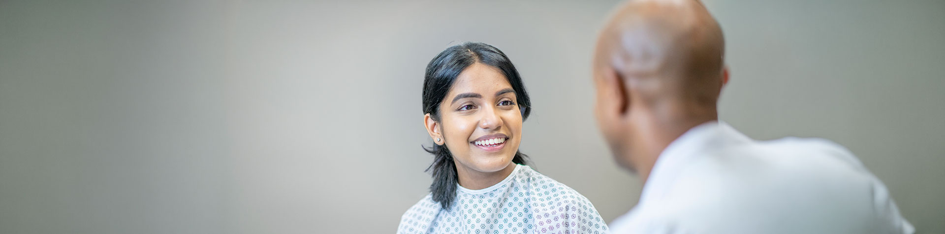 patient talking to doctor
