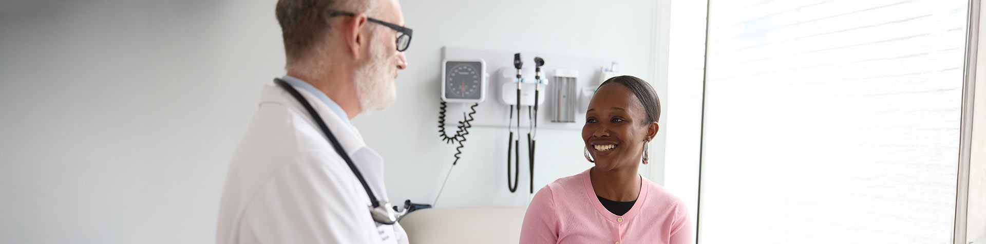 Image of doctor talking to patient