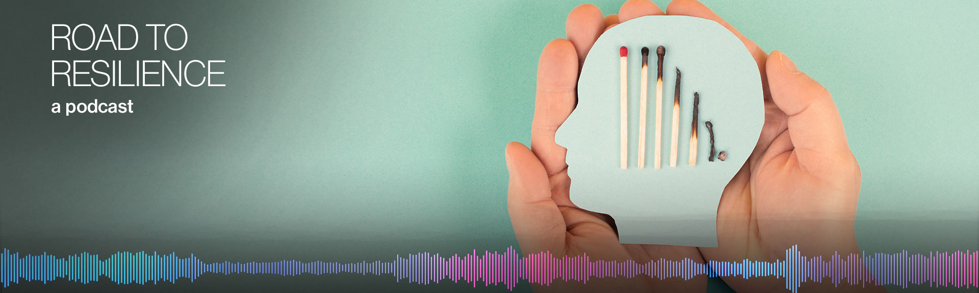 paper silhouette of a head in the palm of a hand