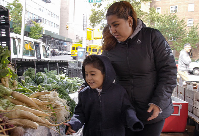 A photo showing Natalia Leal and her son Gabriel, who were participants in the FAMILIA trial.