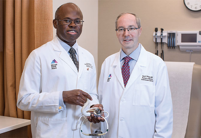 A photo shows Anelechi Anyanwu, MD, Professor and Vice Chair of Cardiovascular Surgery, and Surgical Director, Heart Transplantation and Mechanical Circulatory Support, Mount Sinai Health System, and Sean P. Pinney, MD, with the HeartMate 3 device.