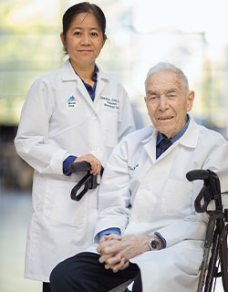 A photo of Joanna C. Jen, MD, PhD, with Bernard Cohen, MD