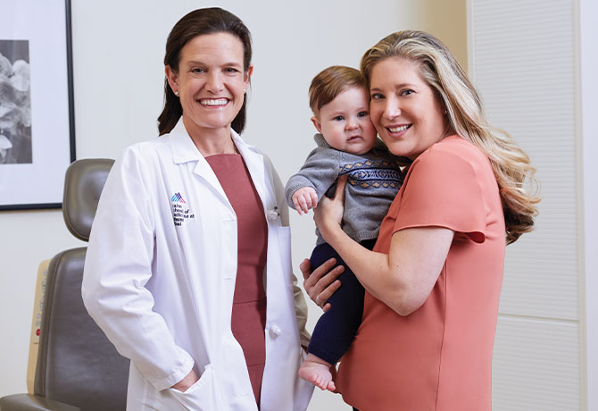 A photo of Stephanie V. Blank, MD, with Andrea and her son, Joaquin