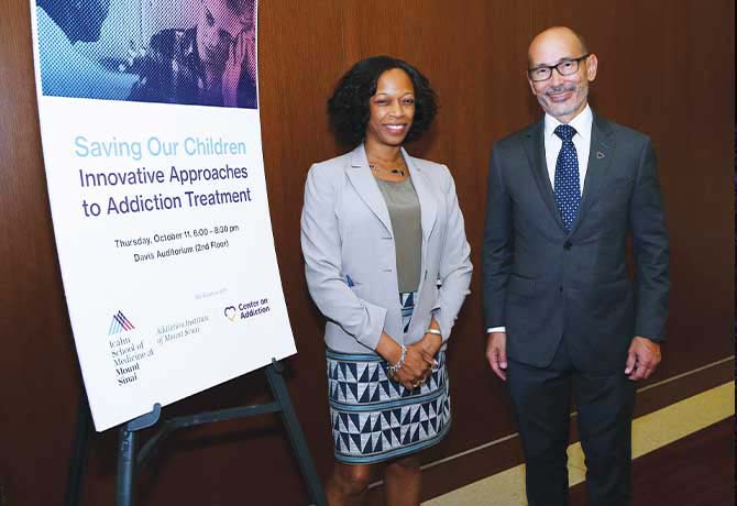 A photo showing Yasmin Hurd, PhD, with Charles J. Neighbors, PhD, MBA, Director of Health
Services Research, Center on Addiction.
