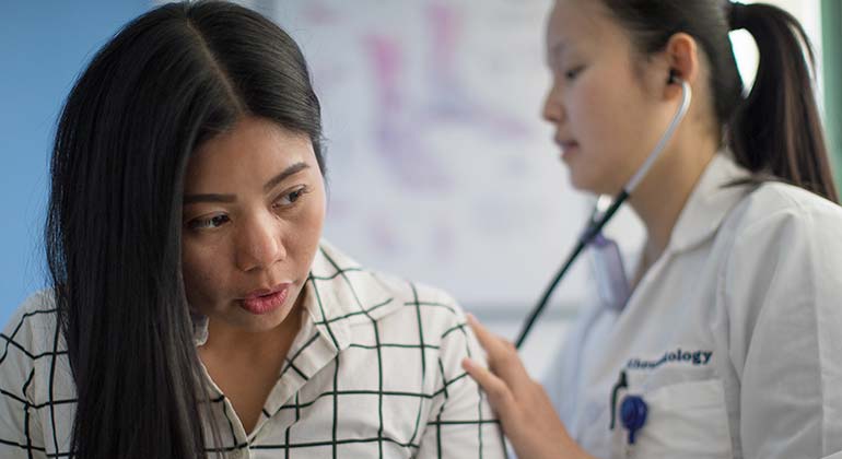 doctor treats patient