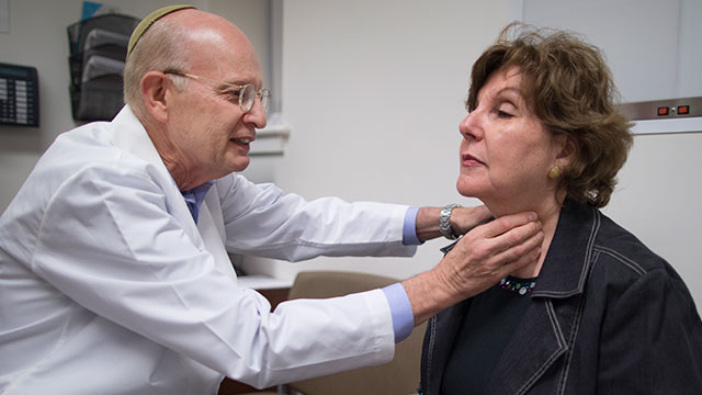 Doctor examining patient