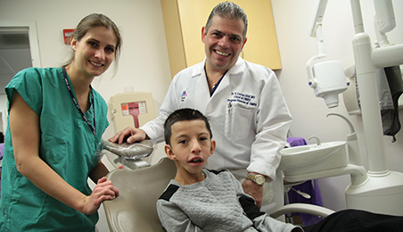 Anthony Valladarez with doctors