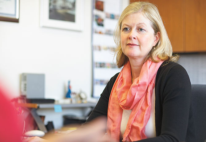 image of woman using computer in office