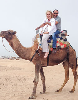 Image of couple riding a camel