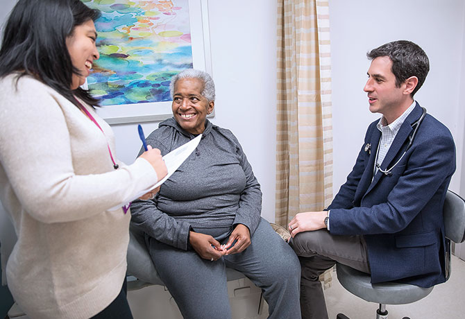 A photo shows Anabella Castillo and Ryan Ungaro, MD, are helping newly diagnosed IBD patients like Yvette Johnson