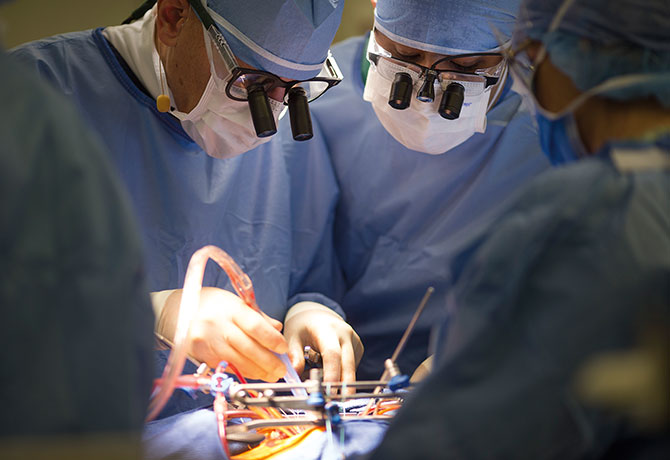 Photo showing David H. Adams, MD, with Ahmed El-Eshmawi, MD