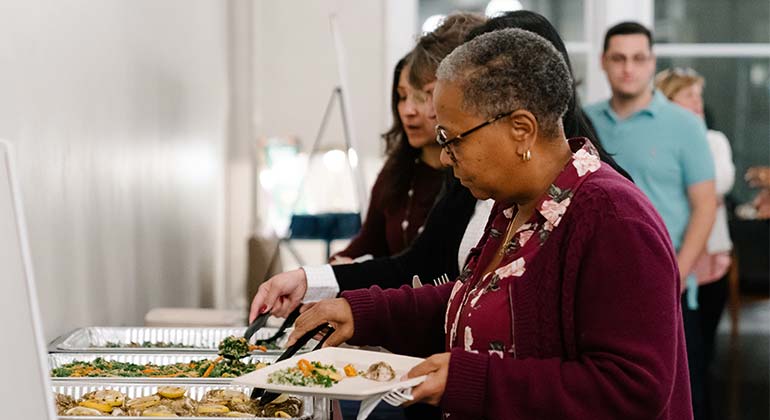 Woman serving food