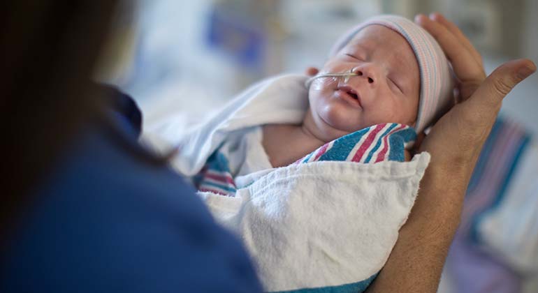 Mom holding baby