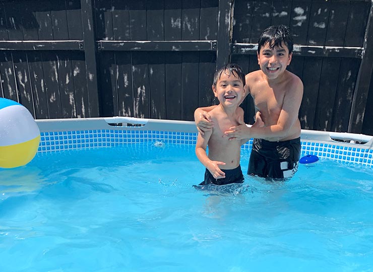 Photo of Image of two kids in a swimming pool