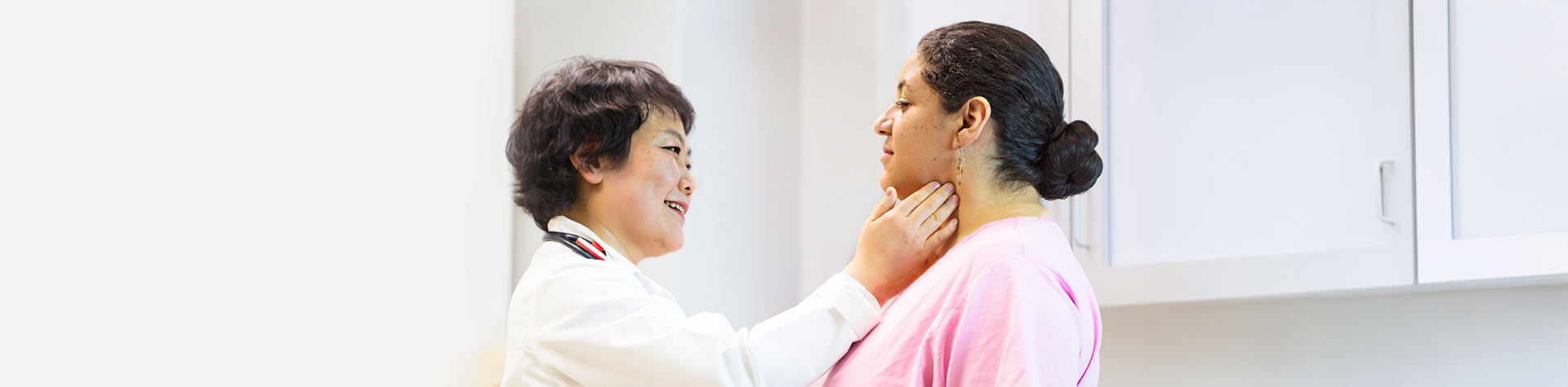 doctor checking patient