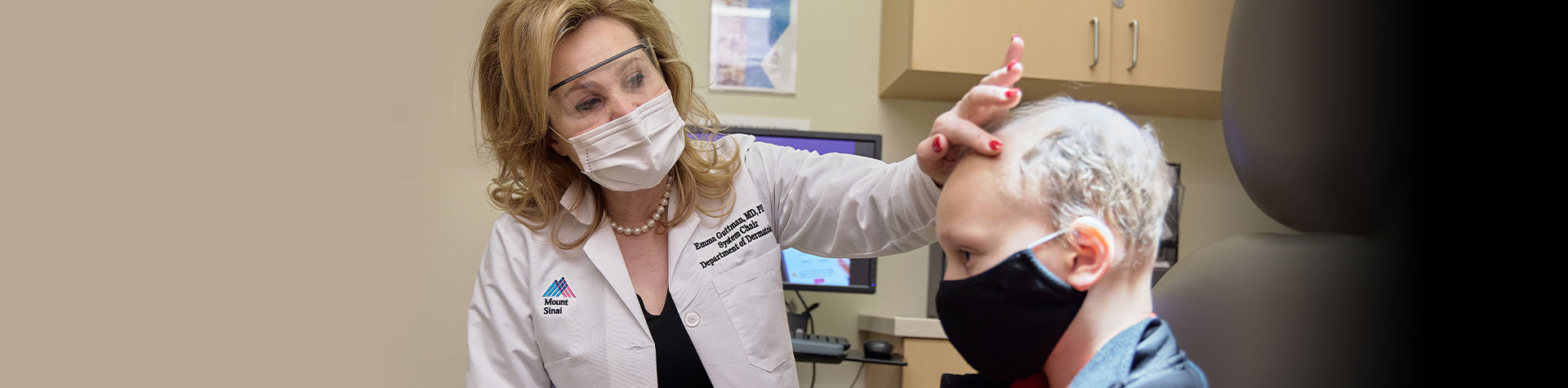 Image of doctor examining patient