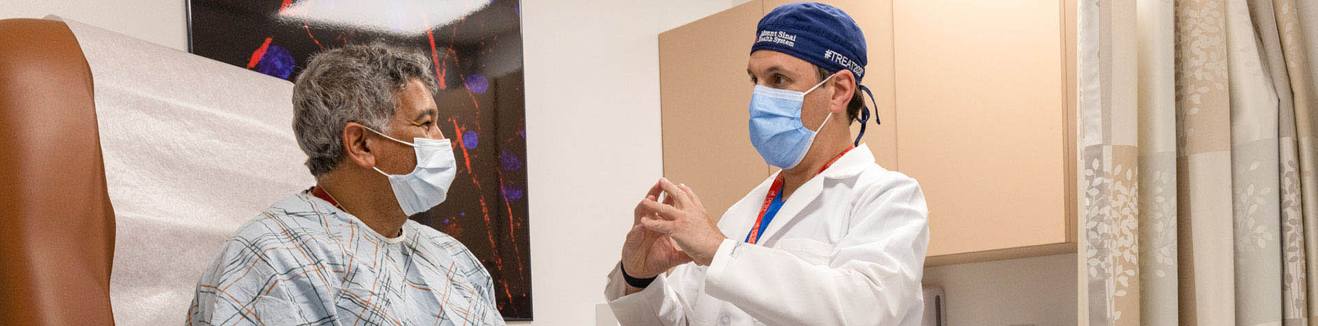 image of doctor talking with patient