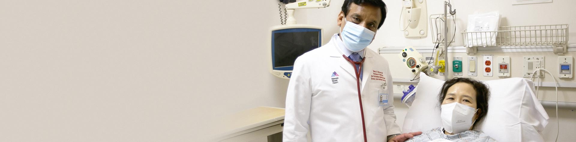 Image of doctor Sharma with patient