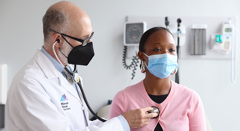 doctor taking patient