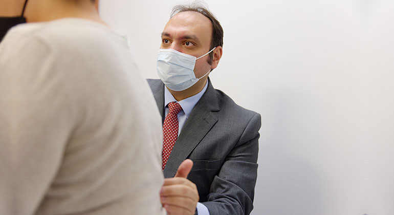 Image of patient talking to doctor